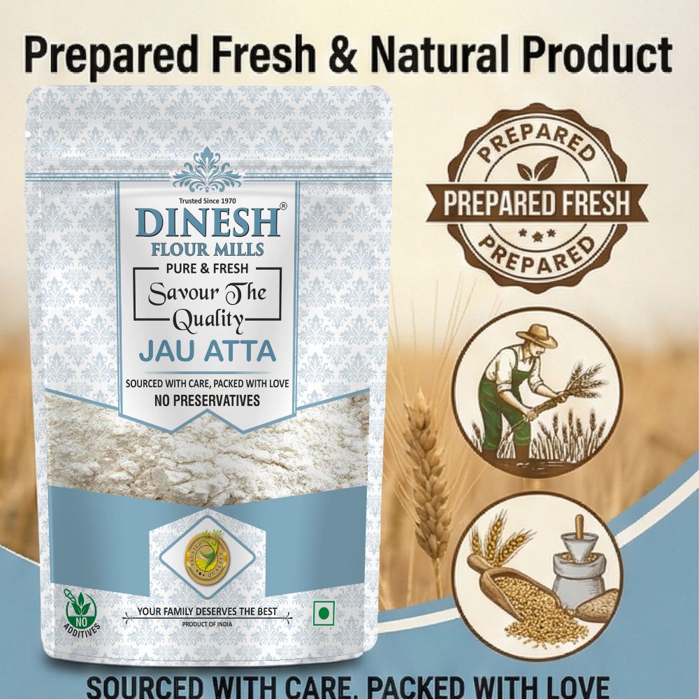 Dinesh Flour Mills Jau Atta packaging with branding and product information on a beige background.