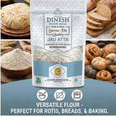 Dinesh Flour Mills Jau Atta package with bread and flour images on a blue background