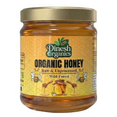 Jar of Dinesh Organics Organic Honey on a white background