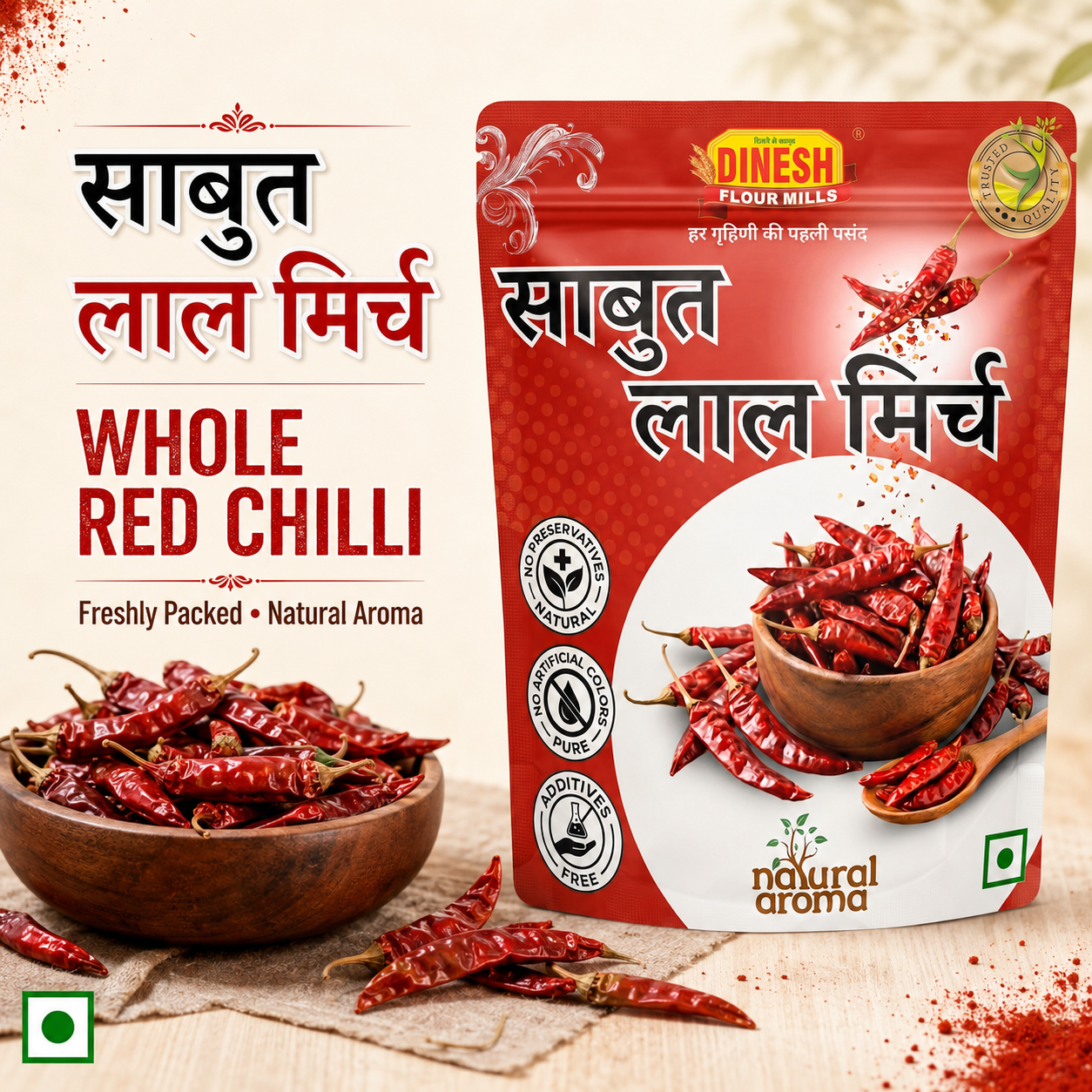 A stand-up pouch of Dinesh Flour Mills Whole Red Chilli spice mix shown on a beige background with Hindi text, a bowl of dried red chilies, and scattered red chili powder.