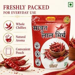 A red stand-up pouch of Dinesh Flour Mills Sabut Lal Mirch (whole red chilies) displayed on a light textured background with decorative dried red chilies. The left side features marketing text and icons highlighting 'Whole Chillies', 'Natural Aroma', and 'Convenient Pouch'.