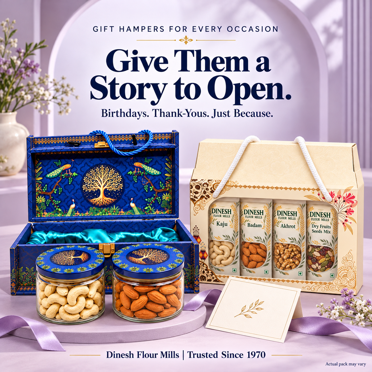 Dinesh Flour Mills royal blue kaju and badam hamper beside a four-pack dry fruit and seeds hamper in a modern lavender studio setting.