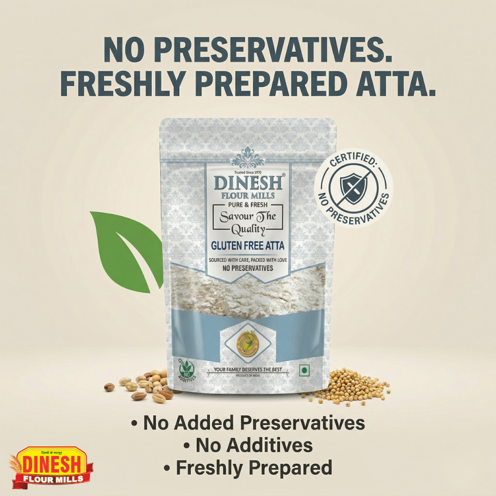 Dinesh Flour Mills gluten-free atta package with text highlighting no preservatives and freshness.