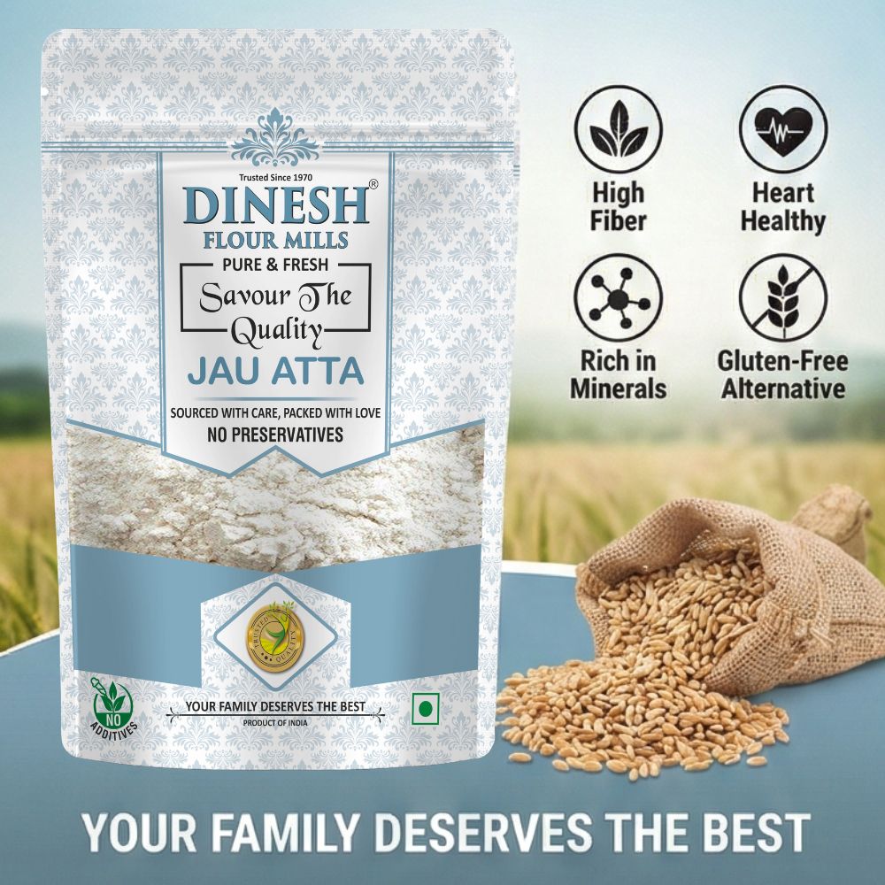 Dinesh Flour Mills Jau Atta packaging with text highlighting benefits and a field background.